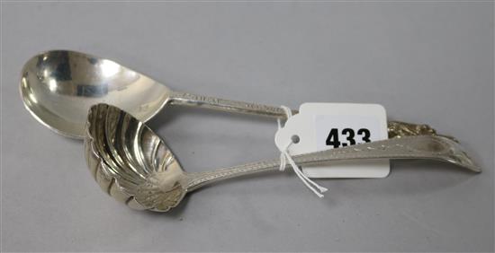 An Edwardian Irish silver sauce ladle and a late silver apostle spoon.